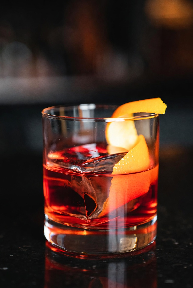 Negroni in a rocks glass with an orange peel
